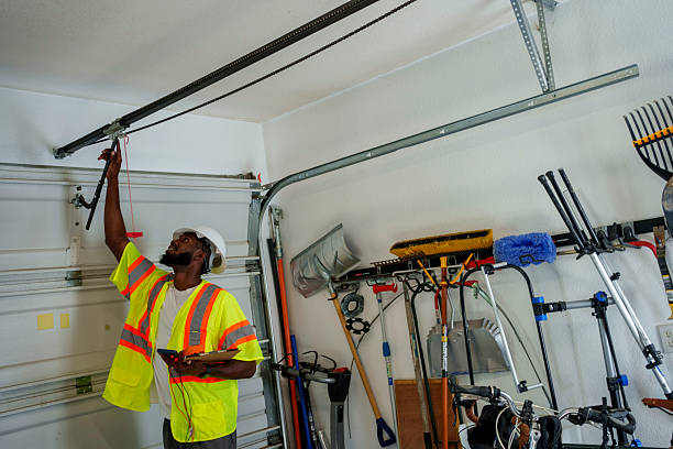 Professional Garage Door Panel Replacement technician working in Conesus Lake, NY